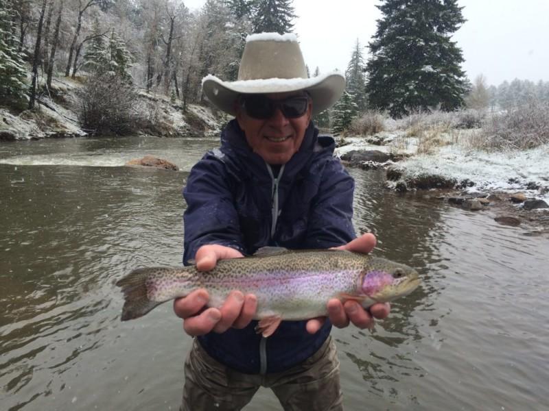 Extended arms of joy with a prize Rainbow Trout on the Private Water section with North Fork Ranch Guide Service.