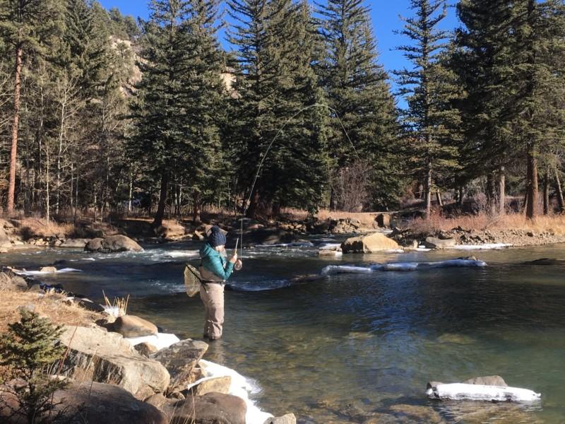 Person fly fishing in the South Platte River